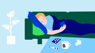 (png) Sjuk person ligger i soffa med filt på sig