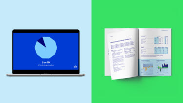 Dator med tårtdiagram och uppslag med tabeller och diagram